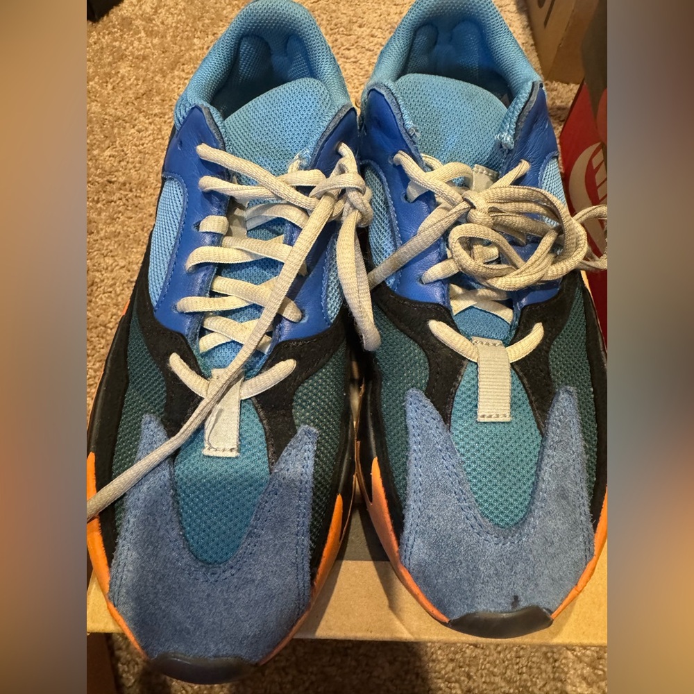 Yeezy Blue and Black Sneakers with Orange Accents